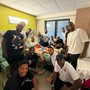 I compagni di squadra di Javier Concepción in visita all'ospedale